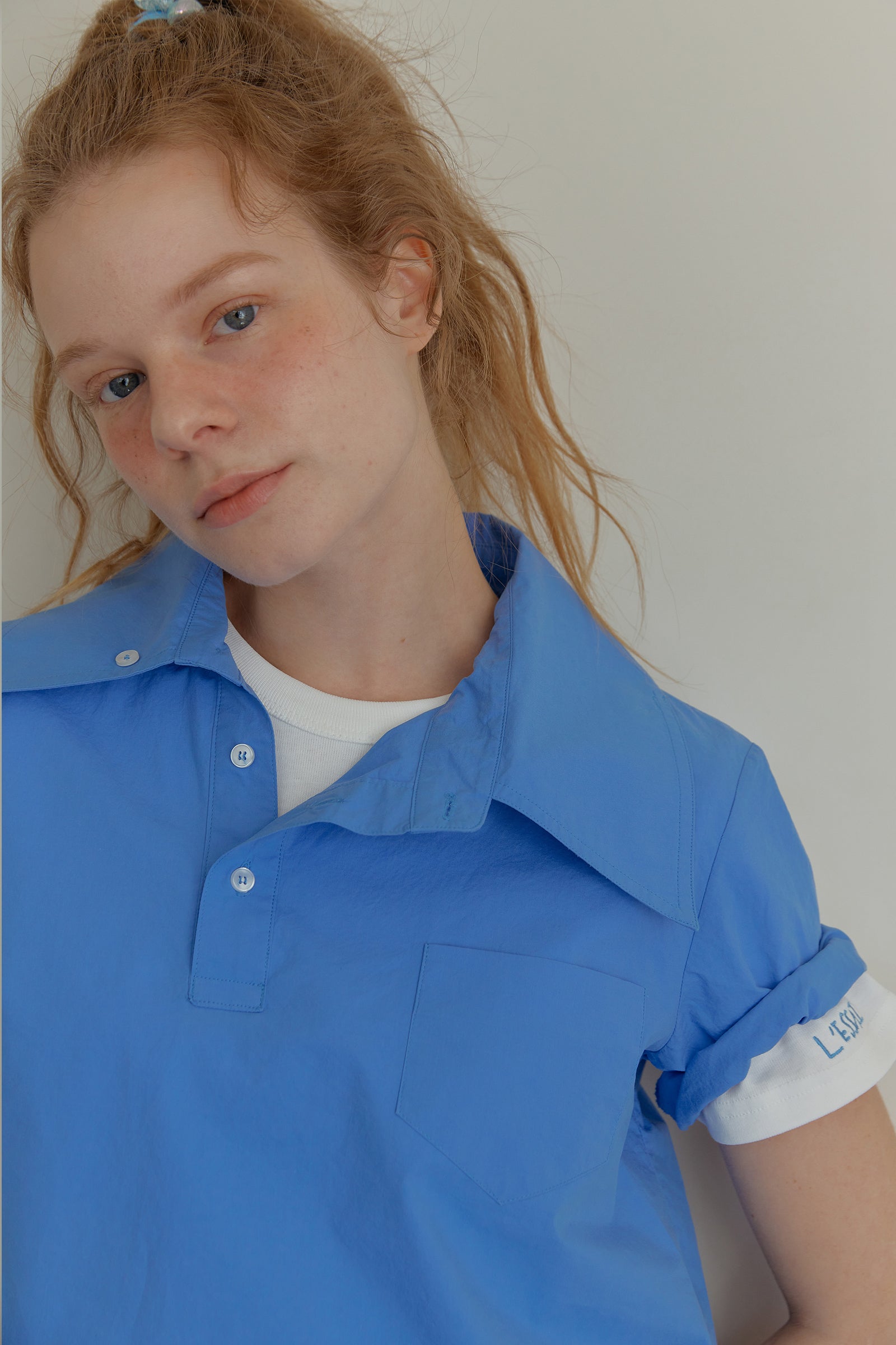 ASYMMETRY COLLAR POLO CROP SHIRT_BLUE