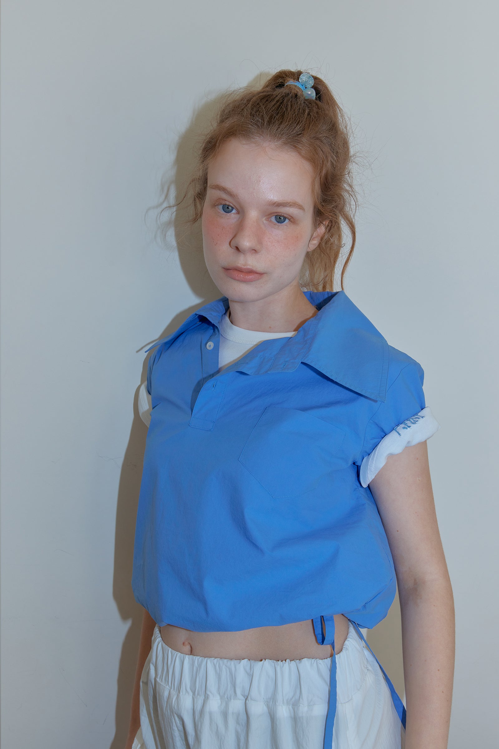 ASYMMETRY COLLAR POLO CROP SHIRT_BLUE